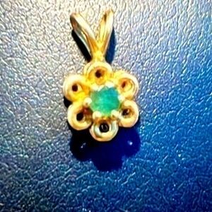 Vintage 14k gold and Genuine Emerald pendant .